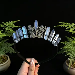 Handmade raw crystal crown headband with elegant metal butterfly detail, perfect party hair accessory.