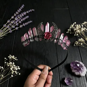Detailed view of the natural pink crystal quartz crown headband with hollow moon and rose.