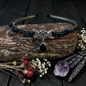 Detailed shot of handmade crystal moon headband with blue sandstone and pentagram charm.
