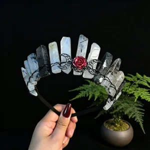 Gothic crystal tiara detail showing raw black and white quartz clusters, moon phase and red rose.