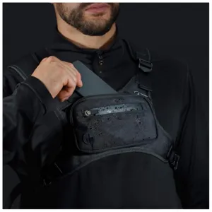 Detailed view of black tactical chest bag, vest style running sports phone bag, durable nylon.