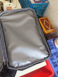 Detail shot of the insulated cooler backpack interior leakproof compartment lining.