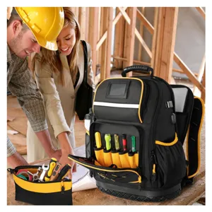 Heavy duty tool backpack detail showing multiple pockets, hard rubber bottom and laptop sleeve.