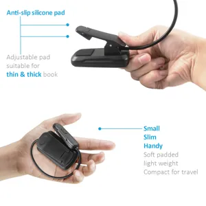 Portable LED clip-on reading light with flexible gooseneck and anti-slip silicone pad for books.