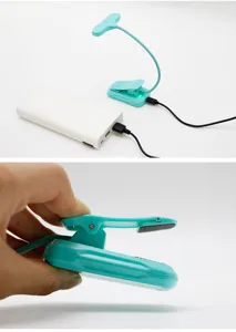 Draagbare mini LED leesclip lamp met flexibele zwanenhals en oplaadbare batterij ontwerp.
