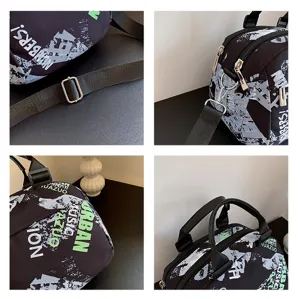 Detail view of the printed canvas shoulder bag showing zipper, strap, and graphic patterns.