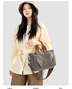 Canvas tote bag for women, large capacity shoulder bag, casual crossbody bag with brown straps.