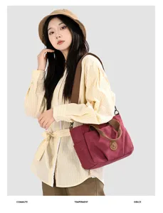 Stylish women canvas shoulder bag large capacity casual tote handbag for daily commute.