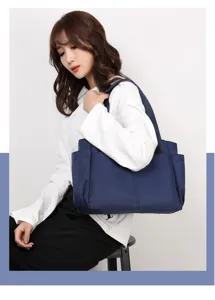 Solid color casual nylon shoulder bag, large capacity multi-pocket travel tote for women.