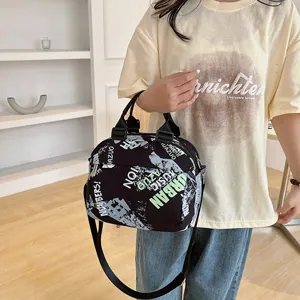 Canvas crossbody handbag with trendy urban graffiti print, casual daily shoulder tote bag.