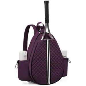 Waterproof purple quilted tennis backpack with racket compartment and side bottle pockets.