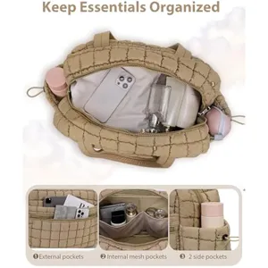 Puffy quilted travel tote bag with multiple convenient storage pockets and compartments.
