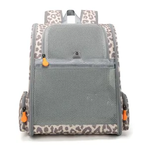 Detailed view of the breathable pet backpack with leopard print, mesh panels, and orange zippers.