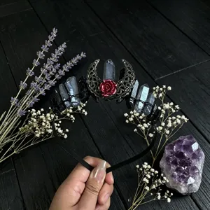 Gothic crystal crown headband featuring moon and red rose design, elegant hair accessories.