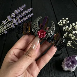 Detail view of a gothic natural crystal crescent moon flower headband for women hair accessory.