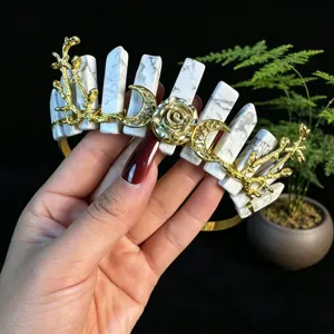 Crystal crown headband with white stone pillars and gold metal moon and rose accessories.