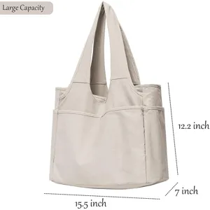 Detail view of a large capacity canvas tote bag with multiple pockets and dual straps.