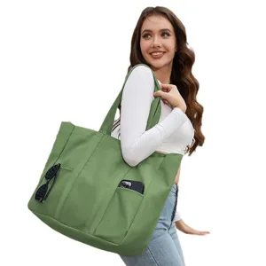 Womens casual canvas tote bag with multi pockets, large capacity shoulder bag for daily use.