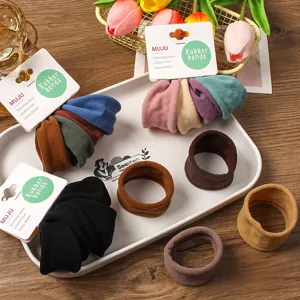 Detail shot showing Korean wide fabric hair bands, soft elastic headbands in multi colors.