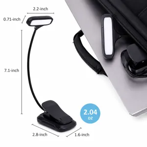 Close-up detail of flexible LED clip-on reading lamp with adjustable gooseneck and rechargeable battery.