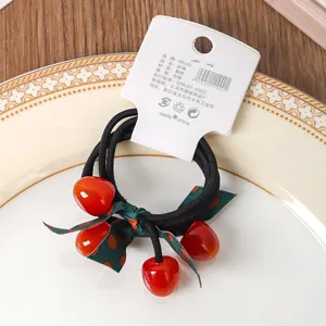 Laccio per capelli elastico con ciliegia dolce e fiocco verde a pois, accessorio coda.