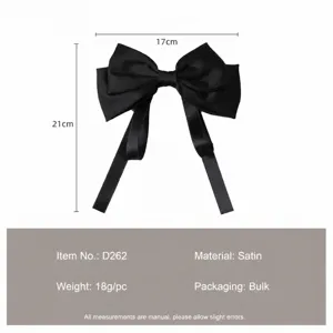 Black satin bow hair clip detail, elegant ribbon hair accessory close-up view, 17x21cm