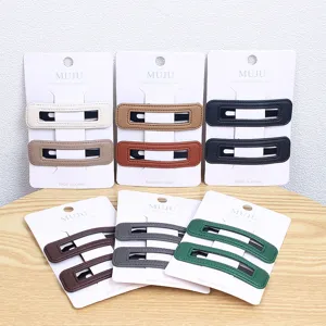 Details of Korean style PU leather hair clips, 2-piece set snap clips for women daily styling.
