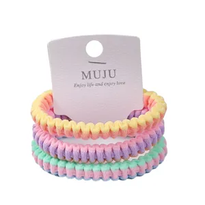 Colorful striped hair scrunchies 3-pack with card packaging for stylish high ponytails.