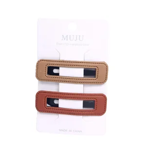 Chic PU leather hair clips set of two snap hair accessories elegant side clips for styling.