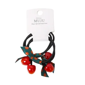 Confezione da 2 elastici per capelli ciliegia carini con nastro a pois verdi, accessori.