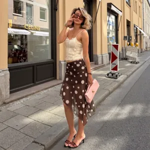 Stylish women's autumn mesh polka dot irregular skirt and lace camisole set for daily wear.