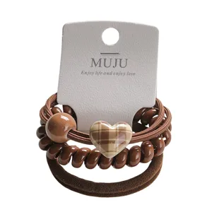 Brown hair ties set featuring cute plaid heart charm and phone cord bands for daily use.