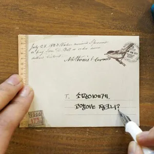 Vintage style small envelope with creative retro design and classic letter patterns for stationery.