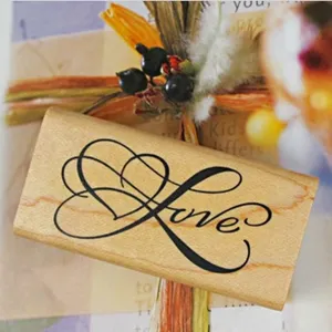 Wooden rubber stamp with love heart design for DIY planner journaling craft decoration art.