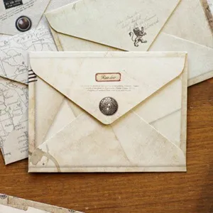 Vintage style paper envelope with metal button closure, creative retro stationery for letters.