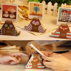 Cute wooden owl phone holder and memo clip stand, creative desktop decoration for office.