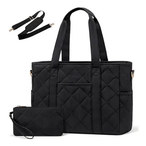 Black quilted tote bag set with matching small pouch and adjustable strap detail view