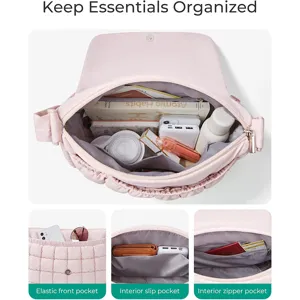 Detailed view of pink quilted crossbody bag interior, featuring zipper and slip pockets.