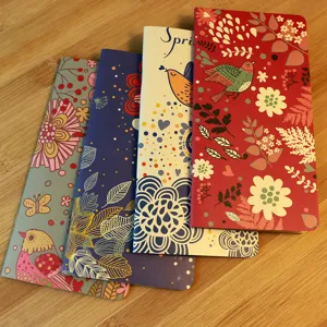 Floral bird pattern pocket notebook 4-pack, portable compact diary for daily office use.