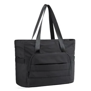 Sac cabas noir matelassé pour femme grand sac léger avec poche avant et lanières de yoga.
