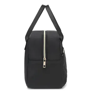 Black quilted insulated lunch bag detail, portable thermal tote bag with gold zipper and handles.
