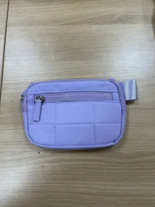 Purple nylon quilted wristlet wallet card pouch with zipper pockets for travel daily use.