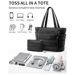 Detail view of black quilted puffer tote bag with spacious storage for daily work and travel.