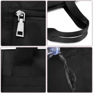 Black nylon travel duffel bag detail view, waterproof fabric and durable metal zipper puller.