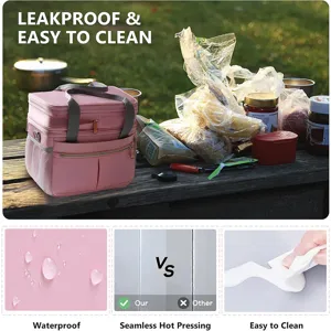 Borsa termica rosa per pranzo con materiale impermeabile, doppio strato e pulizia facile.
