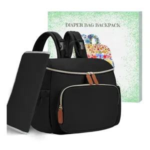 Stylish black diaper bag backpack with portable changing pad, lightweight and durable for parents.