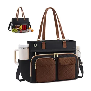 Insulated lunch compartment detail of the stylish black and brown quilted women tote bag.