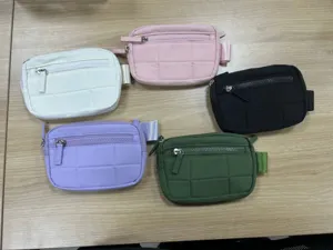 Nylon quilted mini crossbody bag with multiple zippers, versatile travel wallet and card case.