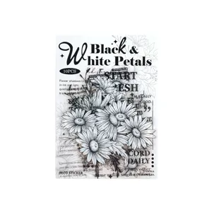 Detailed view of black and white daisy PET stickers, aesthetic floral collage material.