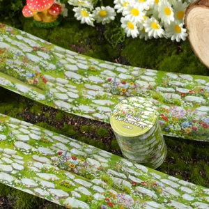 Decorative washi tape with stone path and flower design for journal DIY and notebook crafts.